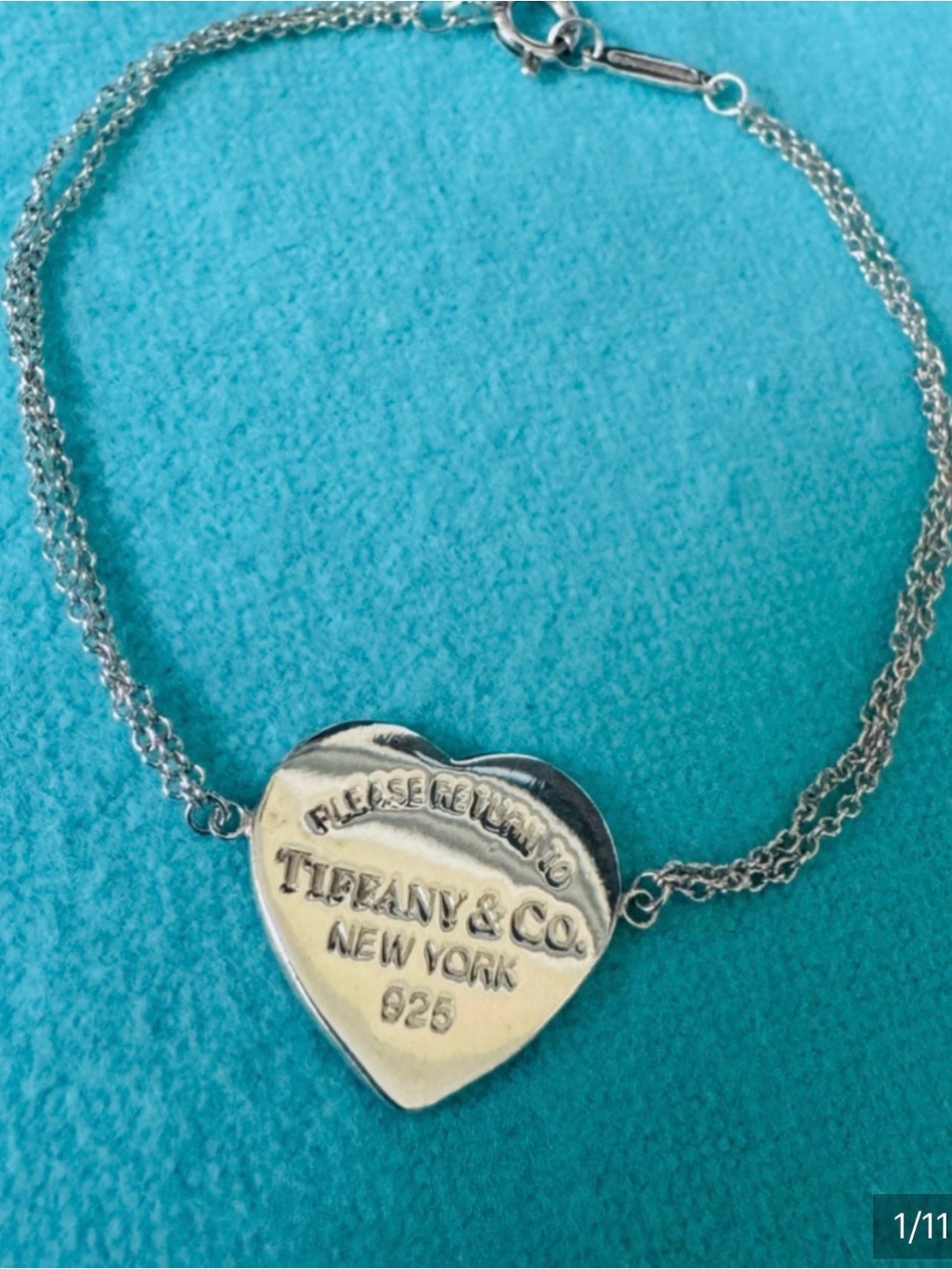 Tiffany & Co. Silver Heart Tag Bracelet with Blue Accents